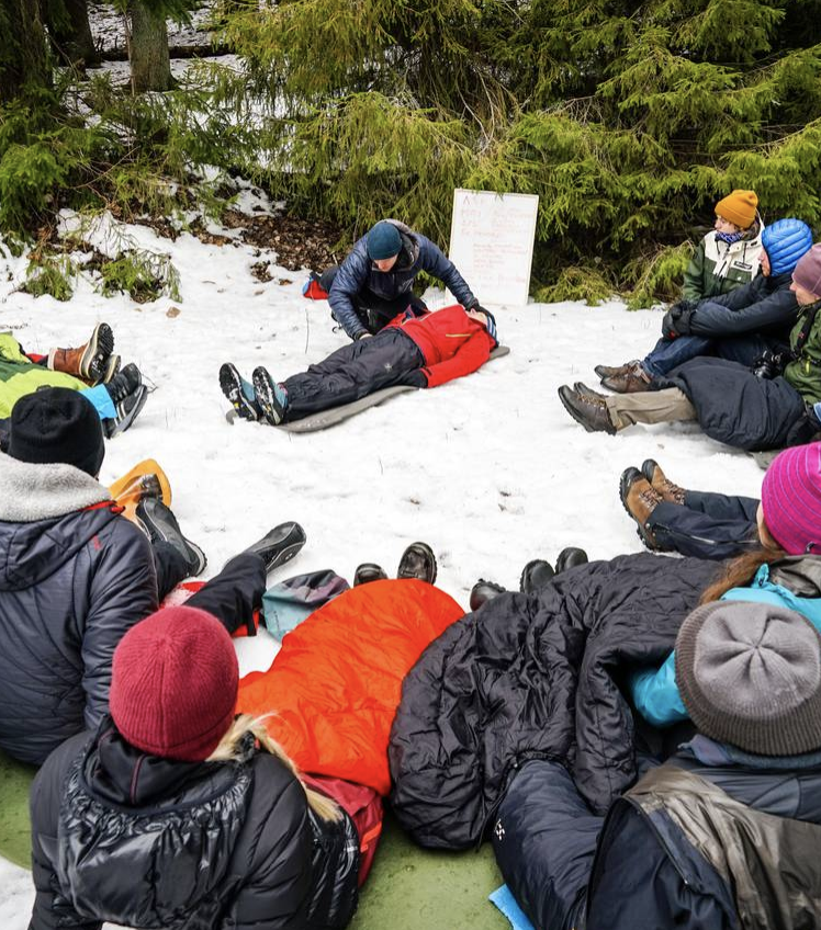 an instructor is demonstrating how to treat hypothermia